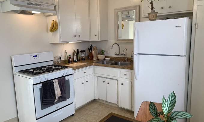 The Strand Apartment | Bright Beach Apartment in Heart of Downtown MB