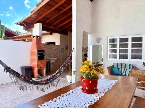 Indaia House | CASA ACONCHEGANTE e PERTINHO DA PRAIA