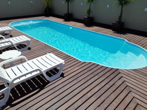 Mariscal House | CASA AMBAR COM PISCINA EM Mariscal BOMBINHAS N 705