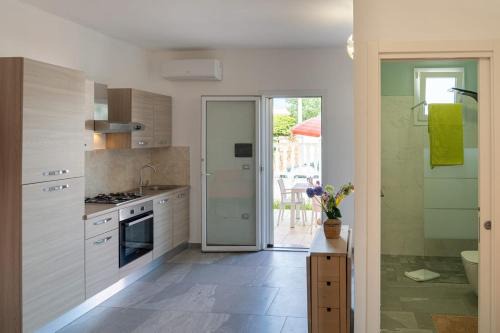 Punta Prosciutto Apartment | Casa Vacanza Mario 1A a 180 mt dal mare di Punta Prosciutto