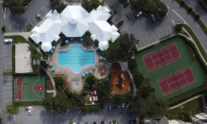 Windsor Palms Condo | CasaComfort near Disney-King Suite bedroom, FREE Amenities, and great location.
