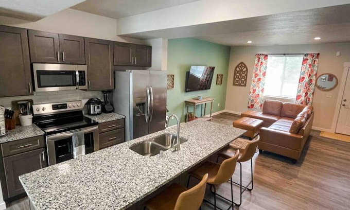 Spokane Apartment | Central 3/2, garage, private yard, walk to arena, EV charger