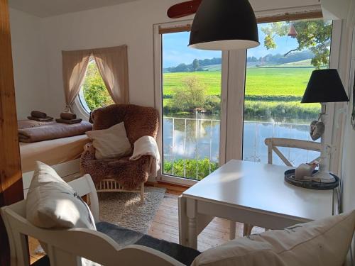 Guxhagen House | Chalet am Flussufer in der Natur mit Kaminofen