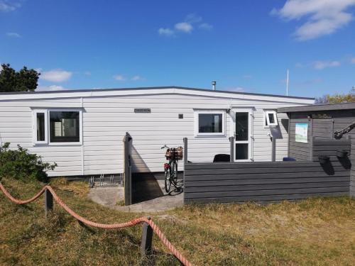 Buren Ski Chalet | Chalet Inn Ameland inclusief Fietsen, Zee en Strand op loopafstand!