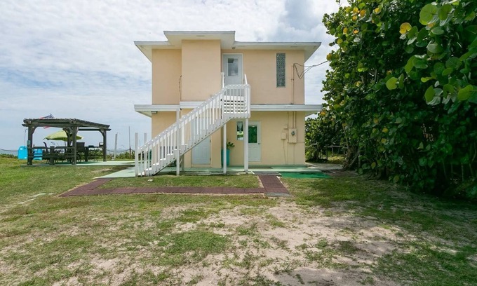 Melbourne Beach House | Charming Two Story House located directly on Melbourne Beach.
