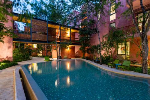 Zama Apartment | Chic Jungle 2 BR Condo by Happy Address