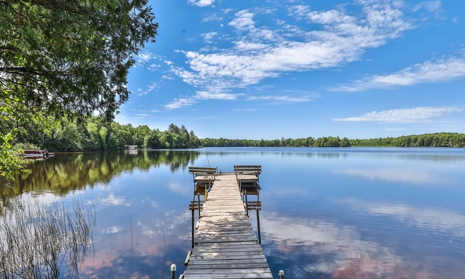 Presque Isle House | Classic, 5-suite, lakefront resort on South Turtle Lake with dock & firepit
