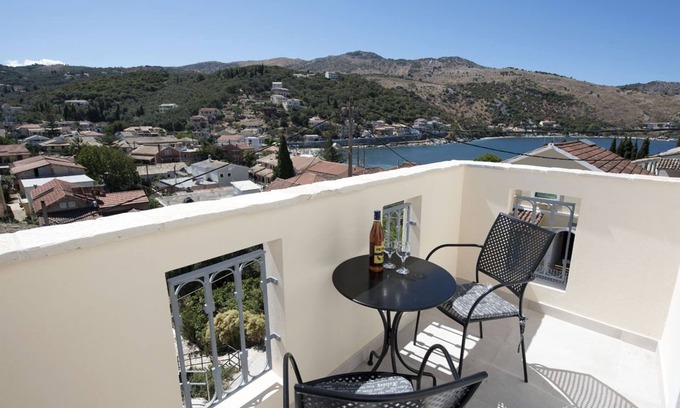 Kassiopi Apartment | Close to the beach, spacious one-bedroom apartment with sea views.