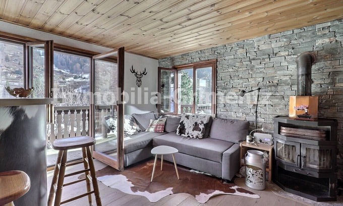 Lauenen Bei Gstaad Ski Chalet | Comfortable chalet on 3 levels for 5 people in Mayoux, living room with wood-burner, kitchen area wi