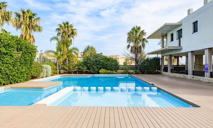 El Grau de Moncofa Apartment | Cosy apartment for 4 guests with A/C, pool, WIFI, TV and terrace