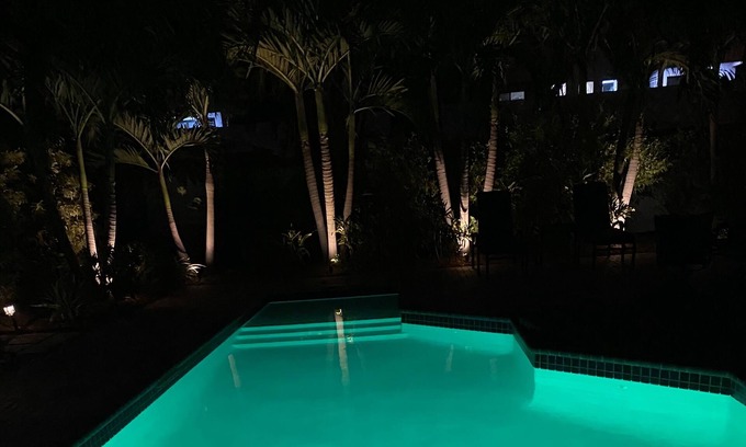Victoria Park Cottage | Cozy Tropical Paradise with heated pool. One mile from the beach.