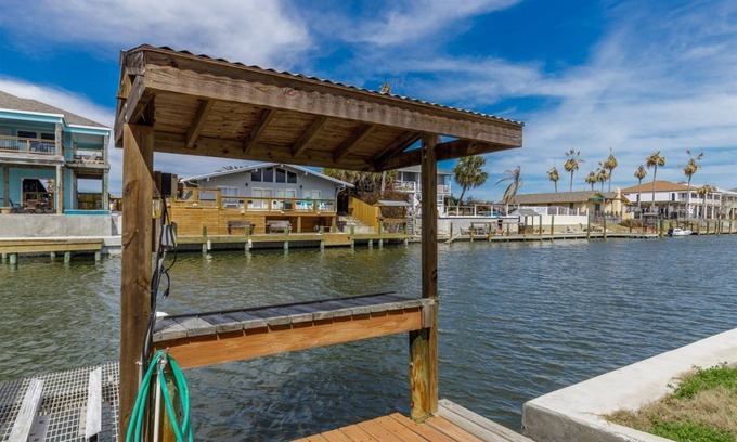 City-by-the Sea House | Crazy about fishing? Check out this home on deep canal near Estes Flats, Redfish Bay, and the Intracoastal Waterway!