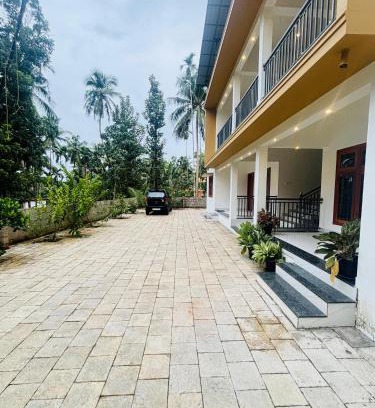 Kedavur House | CT HOMESTAY, Omassery