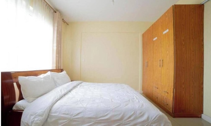 Mbotela Apartment | Deluxe Double Room