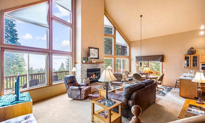 Sandpoint House | Dog-friendly mountain retreat near skiing with lake view, hot tub, & balcony