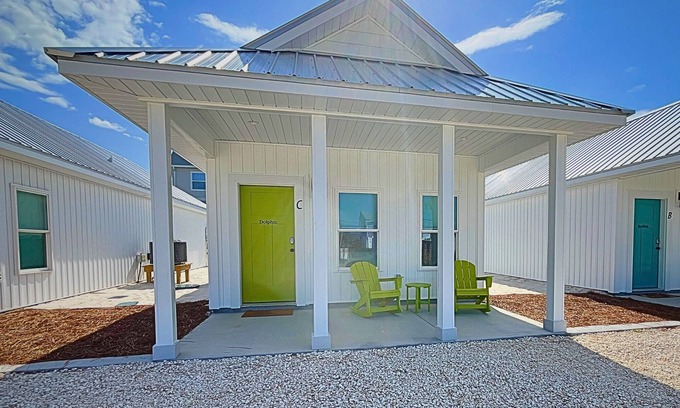 Port St. Joe Cottage | "Dolphin Cottage" is a pet friendly, 2 bed, 1 1/2 bath unit accepting 5 guests. Community Pool.