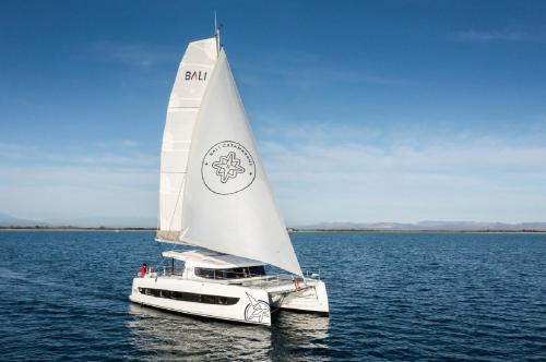 Vallpineda Boat Rental | Dortoka Catamarán