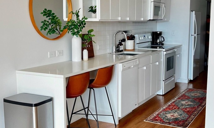 Crossroads Arts District Apartment | Downtown Stunner Right on Street Car