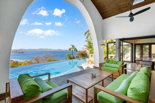 Playa Flamingo House | Dreamy Spanish-Style Villa with Sweeping Ocean Views, Elegant Nautical Design & Giant Infinity Pool