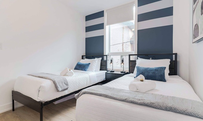 Grange Park Apartment | Elegant Suite—Near Kensington Market, Sleeps 8