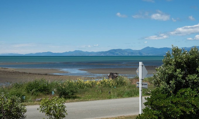 Tasman Cabin | Escape to the tranquil Helme Holiday Bottom Bach, kiwi charm on beautiful Kina Peninsula