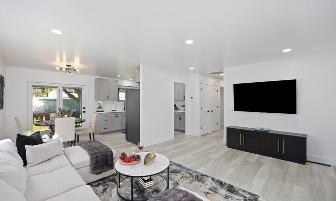 Burley House | Experience elevated comfort in this thoughtfully designed retreat. Featuring two inviting bedrooms, a fully equipped kitchen, and serene details, it blends simplicity with style for a clean, welcoming stay.