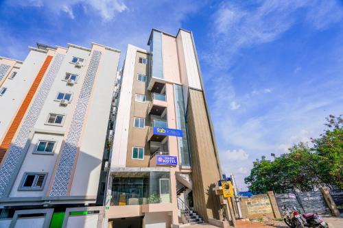 Hyderabad House | FabHotel Orion - Nr Shilparamam, Hi tech city