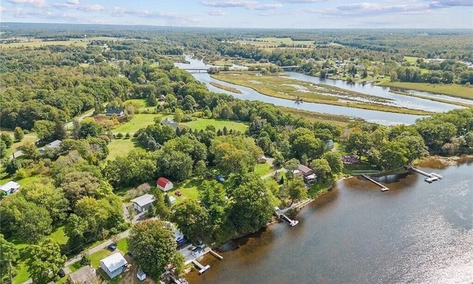 Port Ontario House | Fabulous 3-bedroom House on the salmon river with 126 feet of shoreline!