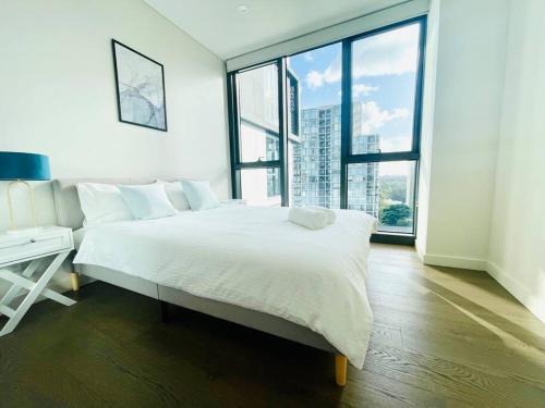 Macquarie Park Apartment | Family Residence (3 Bedrooms, Pool, Gym, Parking)