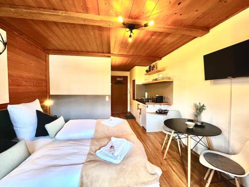 Schliersee Apartment | Ferienwohnung Alpenglühen - mit Sauna & Frühstück