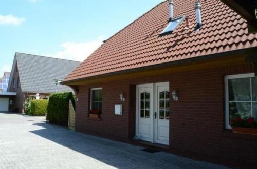 Nordseebad Burhave Apartment | Ferienwohnung in Burhave mit Grill und Garten