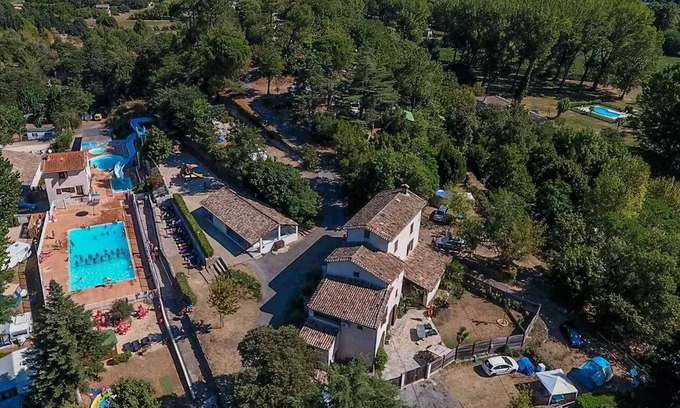 Anduze Ski Chalet | Flower CAMPING FAUVETS * - Chalet OTTAWA Premium 33m2 (3 bedrooms) + covered terrace 14m2 + Air conditioning + LV + Plancha 6 persons