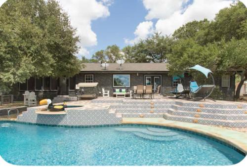 Driftwood House | Four Bedroom Ranch Retreat with a Stunning Pool