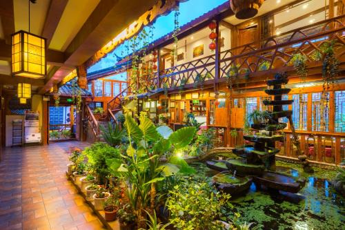 Gucheng Hotel | Frida's Inn 丽江梦之旅观景客栈