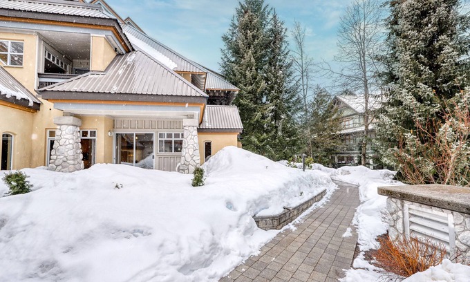 Village North Condo | Ground-floor condo with fireplace & patio - walk or shuttle to ski lifts
