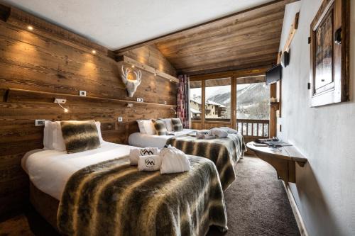 Val-d'Isere Hotel | Hôtel Ski Lodge - Chambres & Appartements - Village Montana
