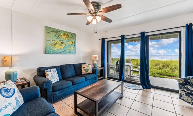 St. George Island Condo | HEAR THE ROAR of the ocean and the slow flapping of the blue herons.