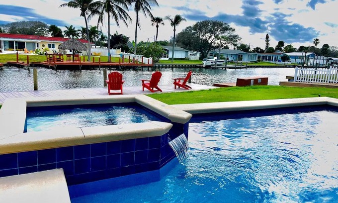 Cocoa Isles House | Heated Pool and Spa-3B/2B Waterfront on Canal close to the Beach