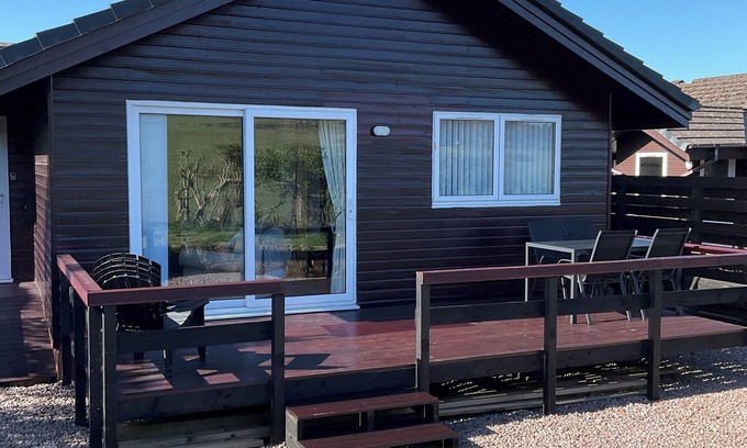 Dumfries Cabin | Heron Lodge, edge of Mabie Forest with breathtaking surrounding views Sleeps 4 .