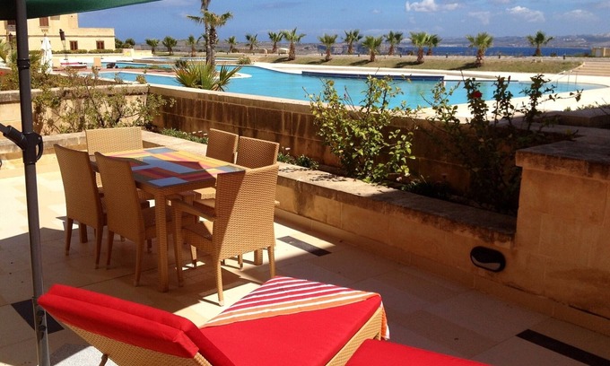 Ghajnsielem Apartment | Historic Fort Chambray Gem: Private Terrace with Panoramic Pool & Sea Views