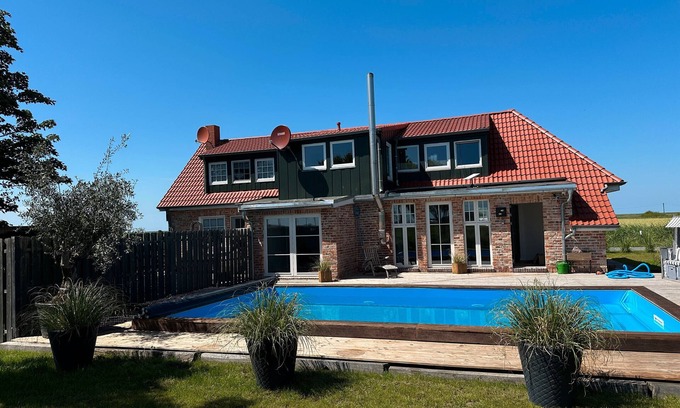 Norden House | Holiday Home 'Huus Ant Diek with Pool' with Private Terrace, Private Garden and Wi-Fi