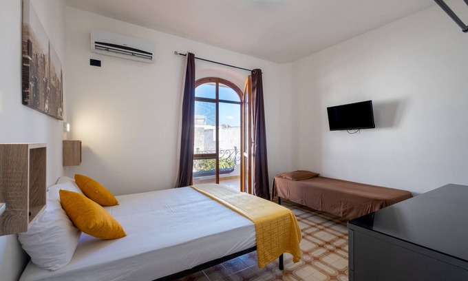 Sant'Isidoro House | Holiday Home 'Villa Gaudì - Milà' with Private Terrace, Wi-Fi and Air Conditioning