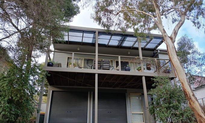 Ocean Grove House | Holiday house nestled among native trees overlooking wetlands