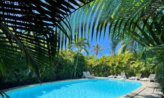 Sainte-Rose House | Homerez - House for 2 ppl. with shared pool, garden and terrace at Sainte-Rose