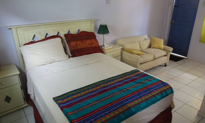 Woodbrook Apartment | HUGE 2nd-floor King studio with all amenities
