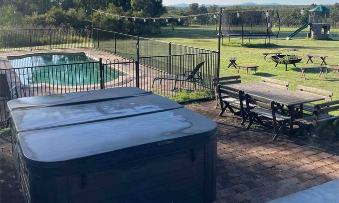 Lovedale House | Ironstone Homestead family private pool and hot spa open fire games room