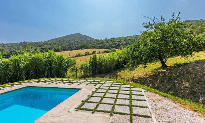 Rosignano Marittimo Villa | Lovely apartment in villa for 17 guests with pool, TV and pets allowed