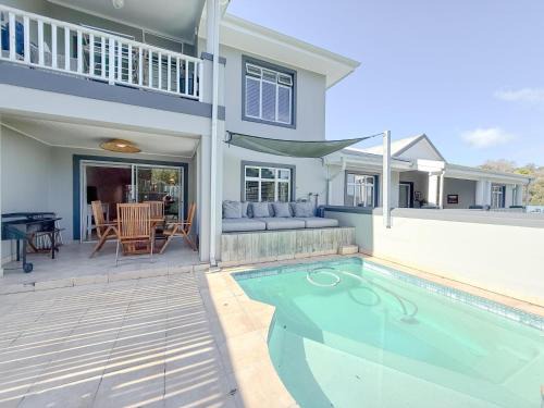 Knysna Apartment | Kloof Gardens: Pool Braai with Lagoon Views