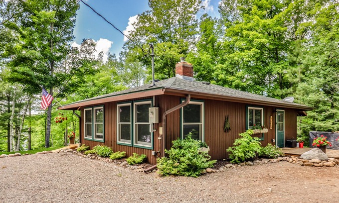 Presque Isle House | Lakefront cabin with dock, kayaks, SUP, wood fireplace, & washer/dryer