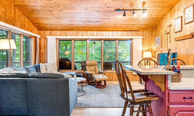 Minocqua House | Lakefront home with a private dock, firepit, fast WiFi, washer/dryer, central AC